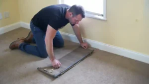 How to use a carpet stretcher